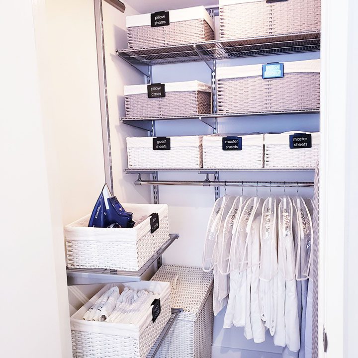 Organize your closet full of clothes with baskets.