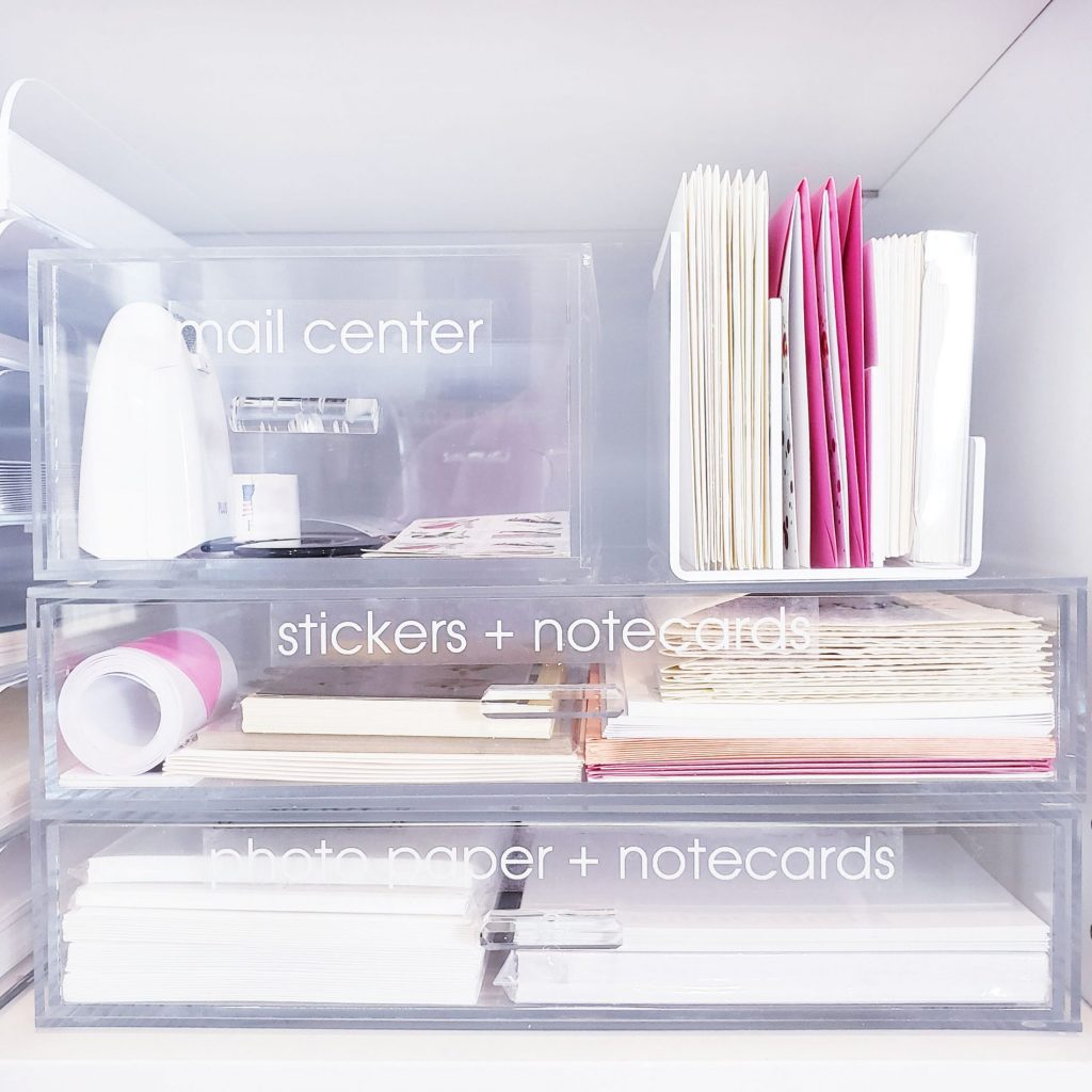 Clear storage bins for organizing your desktop.