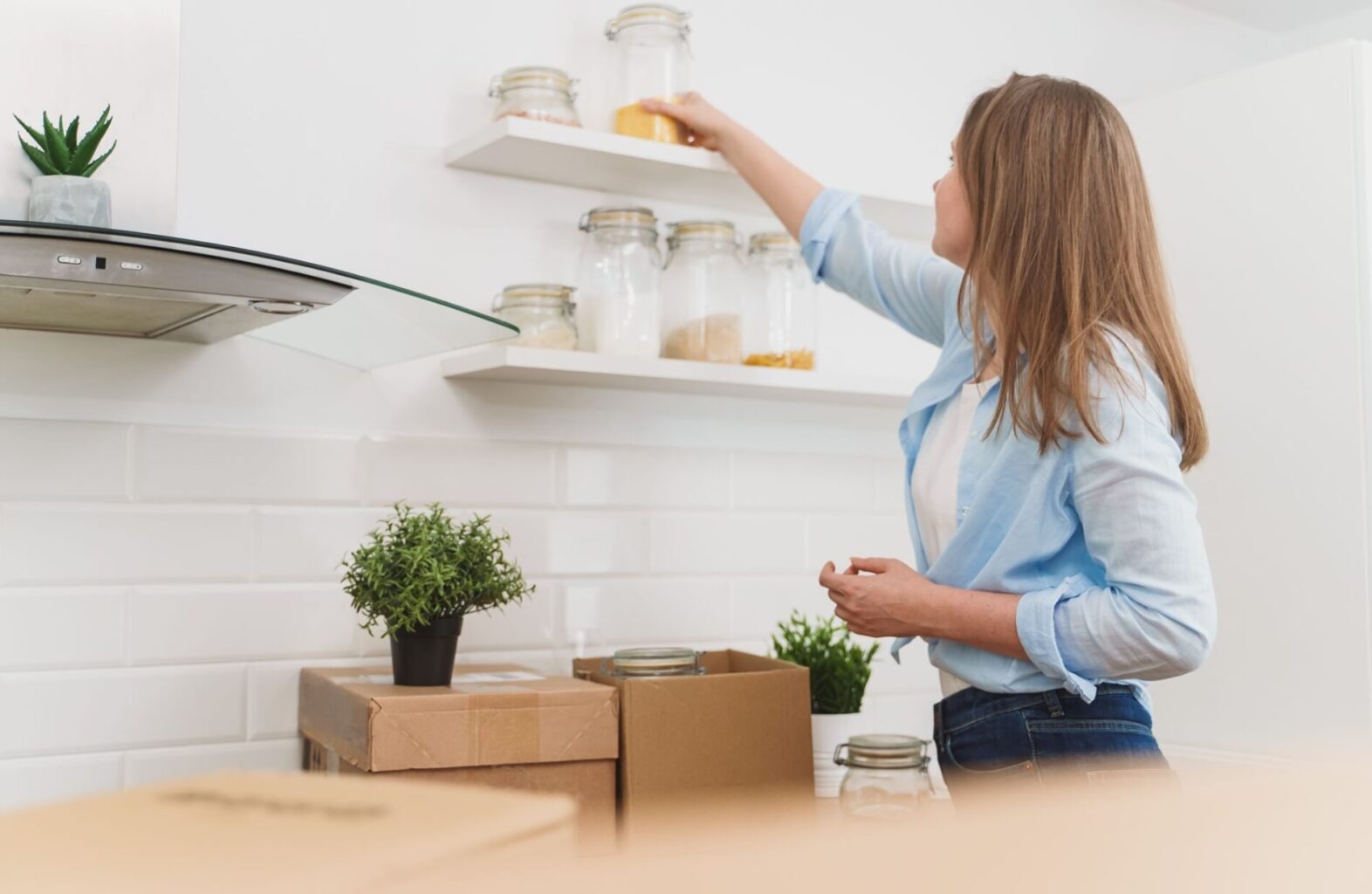 A woman is forming new habits in her new home.