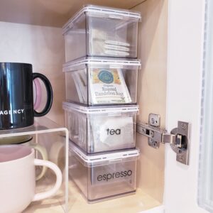 A valentine-themed kitchen cabinet with a cup of coffee and a mug.
