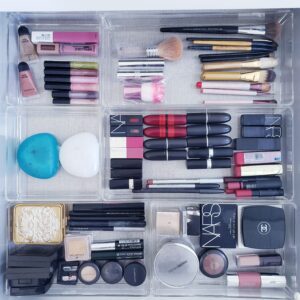 A valentine-themed drawer full of cosmetics and makeup products.