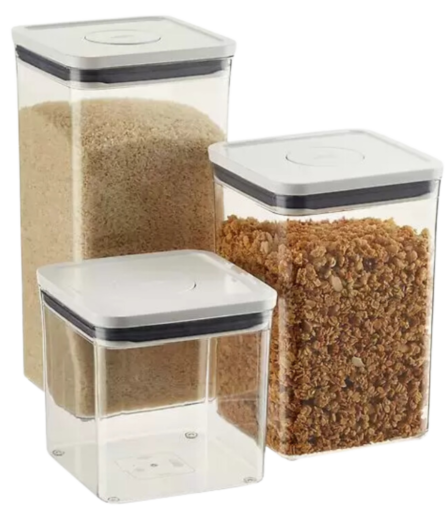Three clear storage containers with granola in them.
