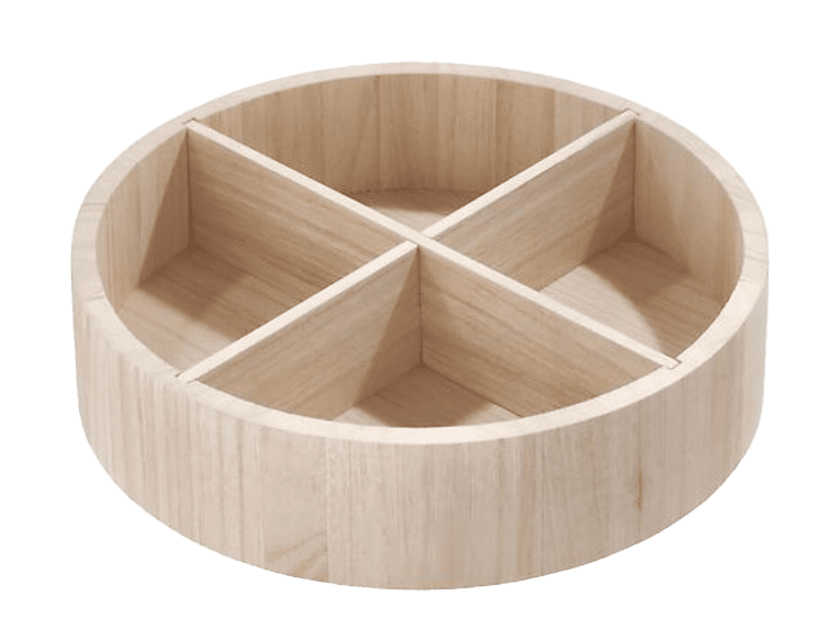 A circular wooden tray with four compartments.