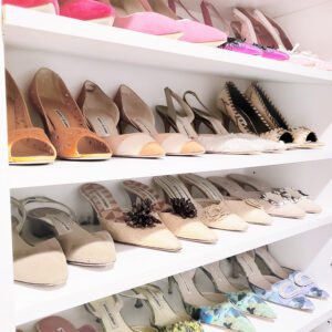 tidy shoes in a white closet